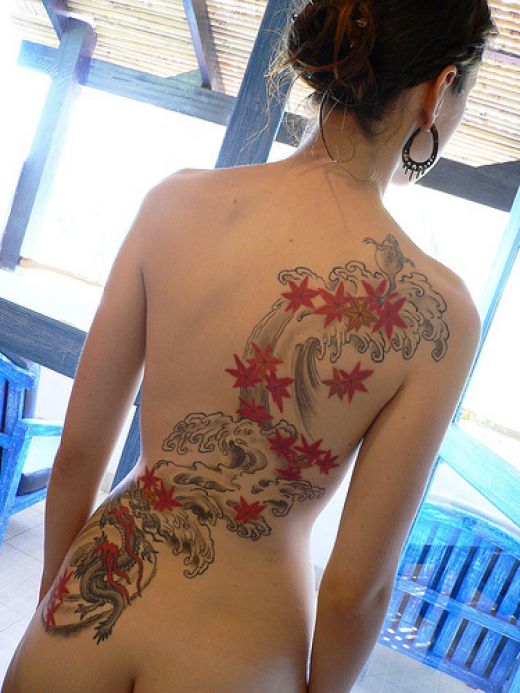  Butterfly tattoo design on lower back women · Japanese koi fish 